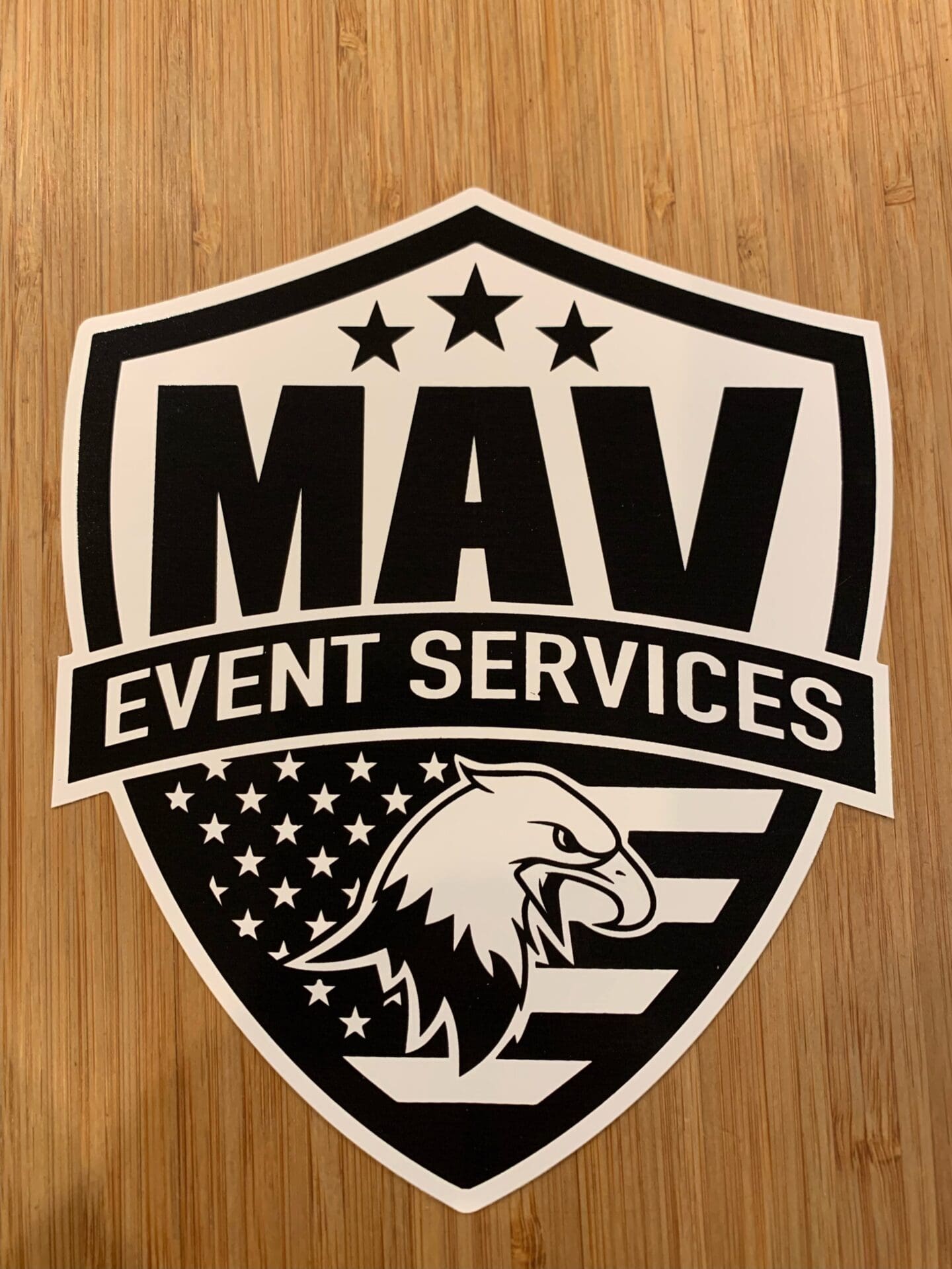 A black and white logo of an event services company.
